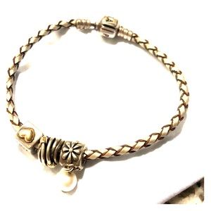 Pandora leather bracelet with three charms